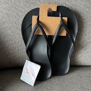 Men’s Archie Flip Flops. Black and never worn.